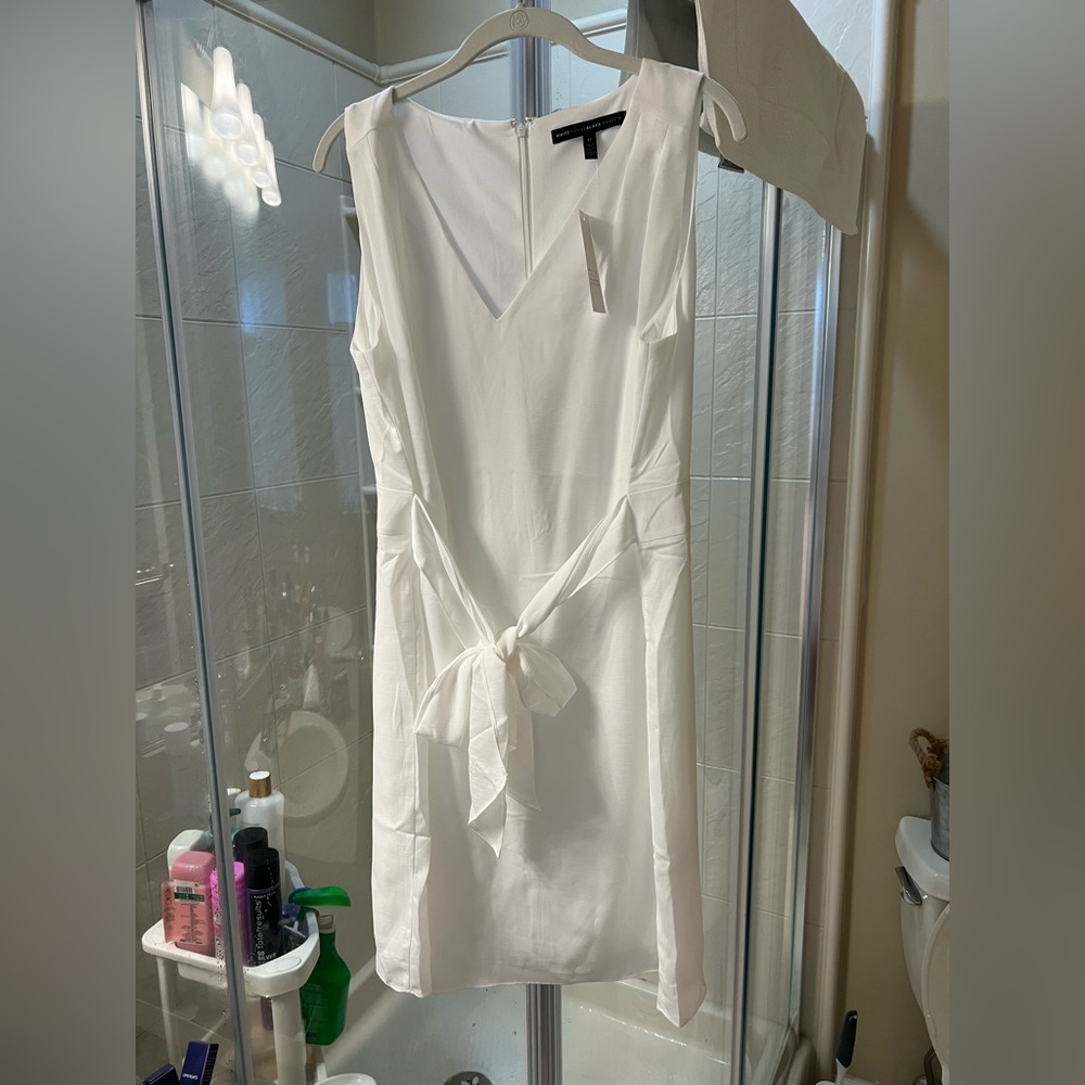 White House black market dress w/ tie sash. Sz 12. New w/ tags. Never worn.
